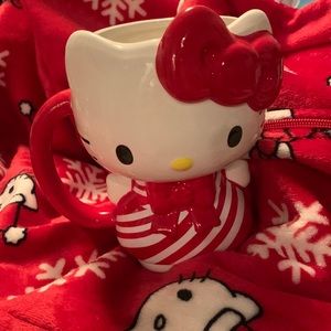 NWT Hello Kitty Holiday Mug/holder featuring Kitty in a candy cane dress
